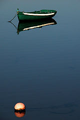 фото "buoy and the green boat"