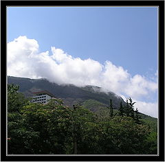 photo "... And clouds were slowly rolled through mountain"