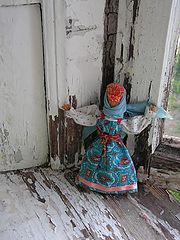 photo "Straw doll on the window"