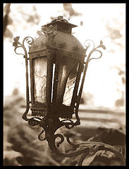 фото "old latern on the graveyard in sepia"