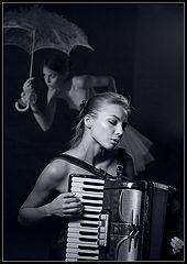 photo "Solo on the accordion in rainy weather"