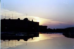 photo "Sunset and effect mirror in water."