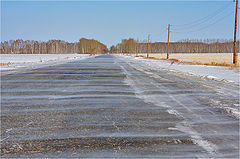 фото "Поземка...(wind carries trickles of the snow across road)"