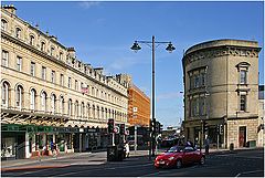 photo "City landscape with a lantern and red car"