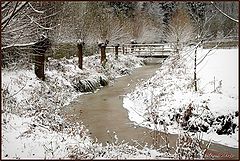 фото "Bridge over frozen river"