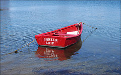 photo "A boat from the sunken ship"