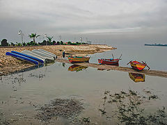 фото "Fisherman and his boats"