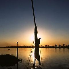 photo "Wrapping up the sail"