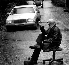 photo "Man sitting on a chair"