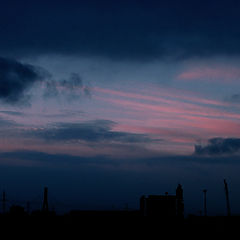 photo "Sunset over a building city"