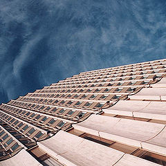 photo "A building drowning in stormy sky"