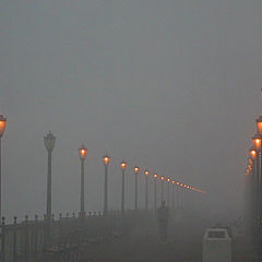 фото "One is off in the pier in a foggy early morning"