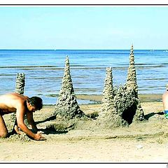photo "Man`s games on sand."