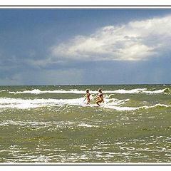 photo "Bathing in the sea before a thunder-storm."