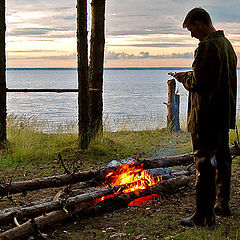 photo "Landscape with a fire and a man silhouette"