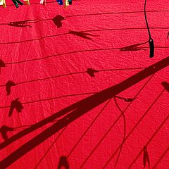 photo "about red bed-sheet and clothes-pegs"