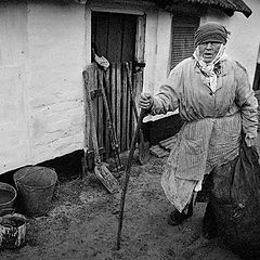 photo "Portrait of the Grandmother with a bag at a shed"