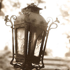 фото "old latern on the graveyard in sepia"