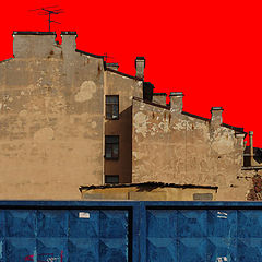 photo "The red sky behind a dark blue fence."