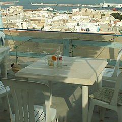 photo "On a terrace cafe des Nomades. End of a siesta."