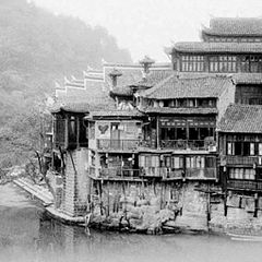 фото "old houses projecting over the water"