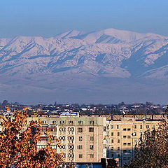 photo "Mountains above а city"