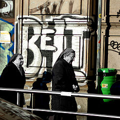 photo "Two religious in the city chaos"