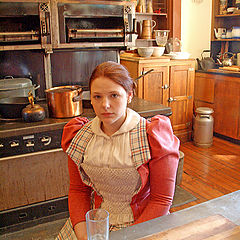 photo "A portrait of a female cook in the kitchen"