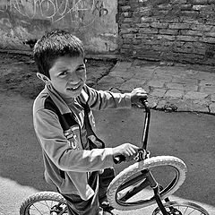 photo "Boy with bicycle"