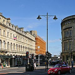 photo "City landscape with a lantern and red car"