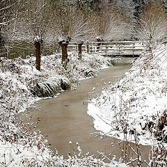 фото "Bridge over frozen river"