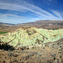 photo "Panorame with a tourist walking down the trail"