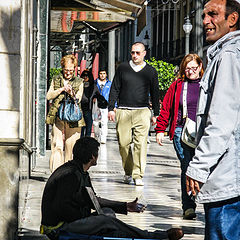 photo "Beggar and Passers-by"