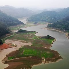 фото "a landscape of lakes and mountains"