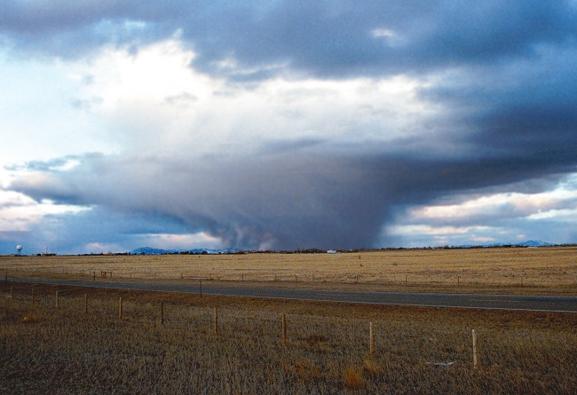 photo "Getting Dumped On" tags: misc., landscape, clouds