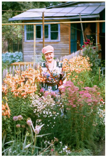 photo "My Grandmother in the middle of blossoming plants." tags: misc., portrait, woman