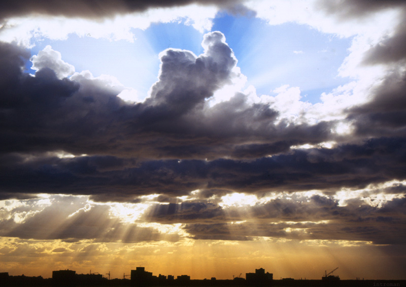 photo "over city" tags: landscape, clouds