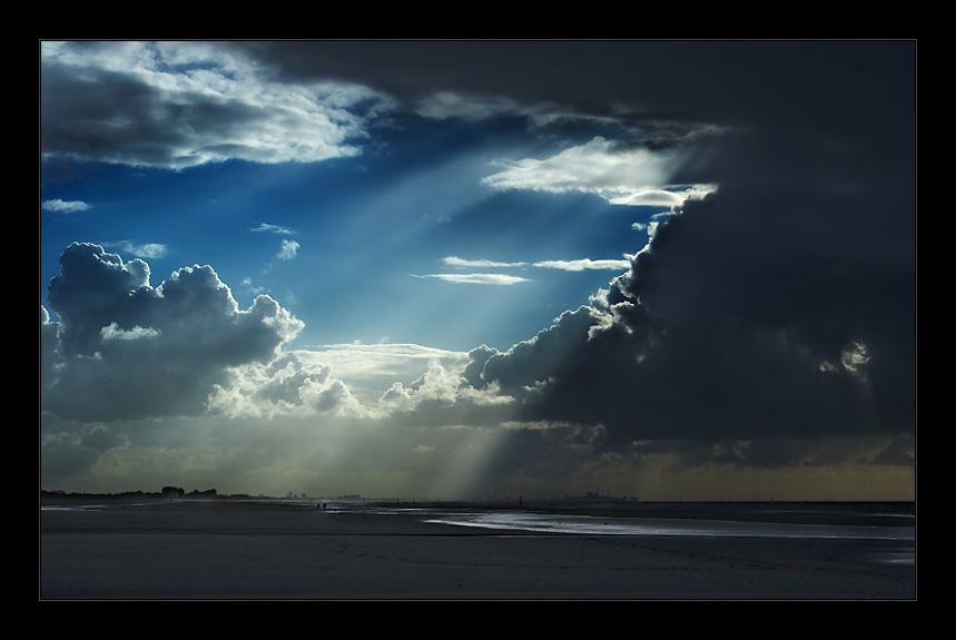 photo "About two figures alone going along an edge of a s" tags: landscape, clouds, water