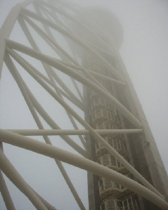 photo "Tower Vasco da Gama, between thick fog, in Parque das Na&#231;&#245;es, Lisbon, Portugal" tags: architecture, landscape, 