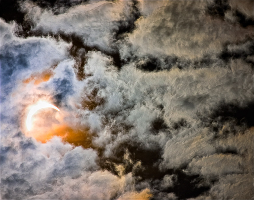 photo "Eclipse (beginning)" tags: landscape, clouds