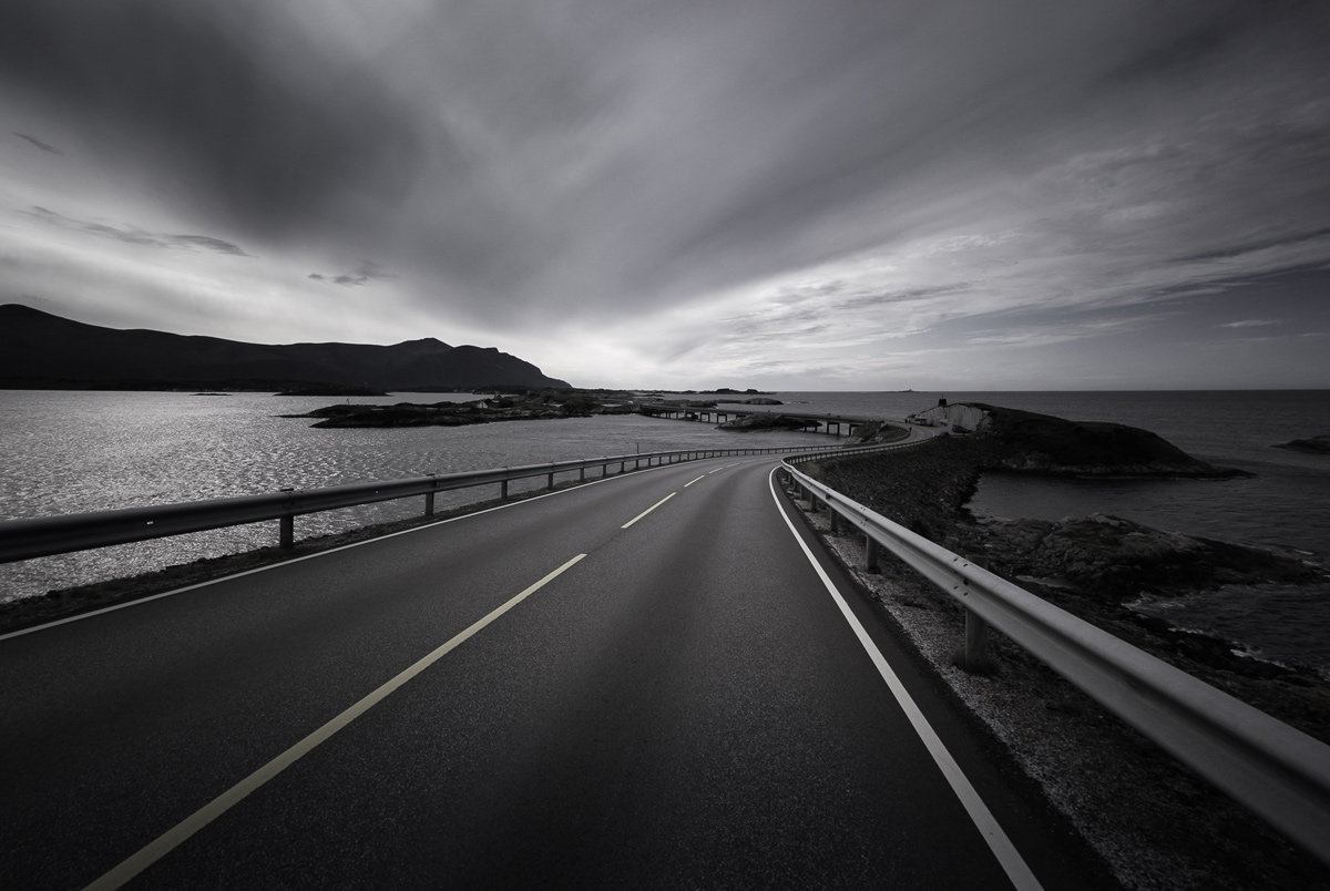 photo "***" tags: black&white, landscape, nature, Europe, Norway, clouds, light, mountains, ocean, road, rocks, water