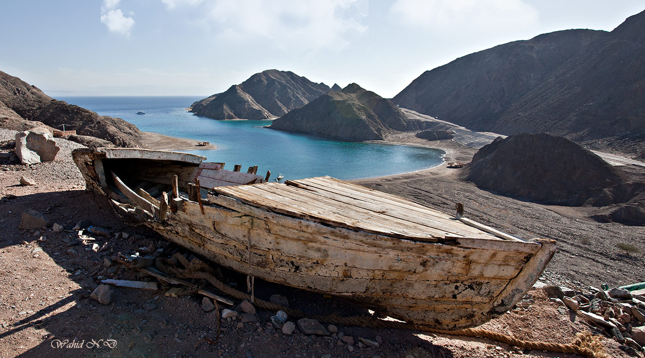 photo "once a boat, coloured version." tags: landscape, travel, boat, water