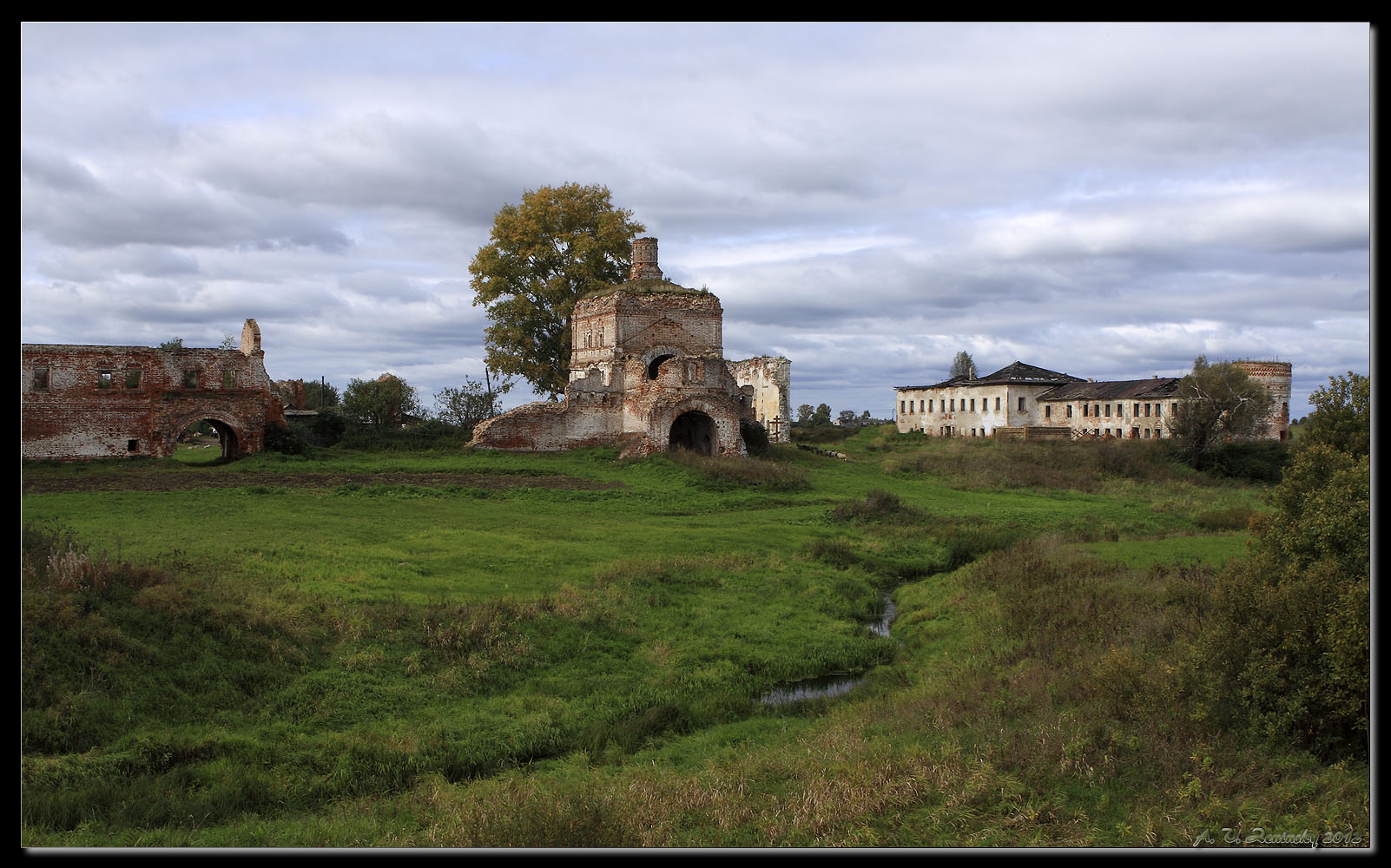 photo "Rural landscape with an old monastery." tags: landscape, architecture, travel, Europe, building, clouds, field, meadow, pets/farm animals, summer, temple