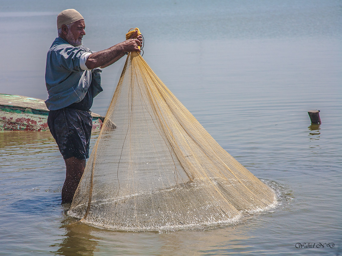 photo "Fisherman & his Net" tags: portrait, nature, reporting, Africa, water