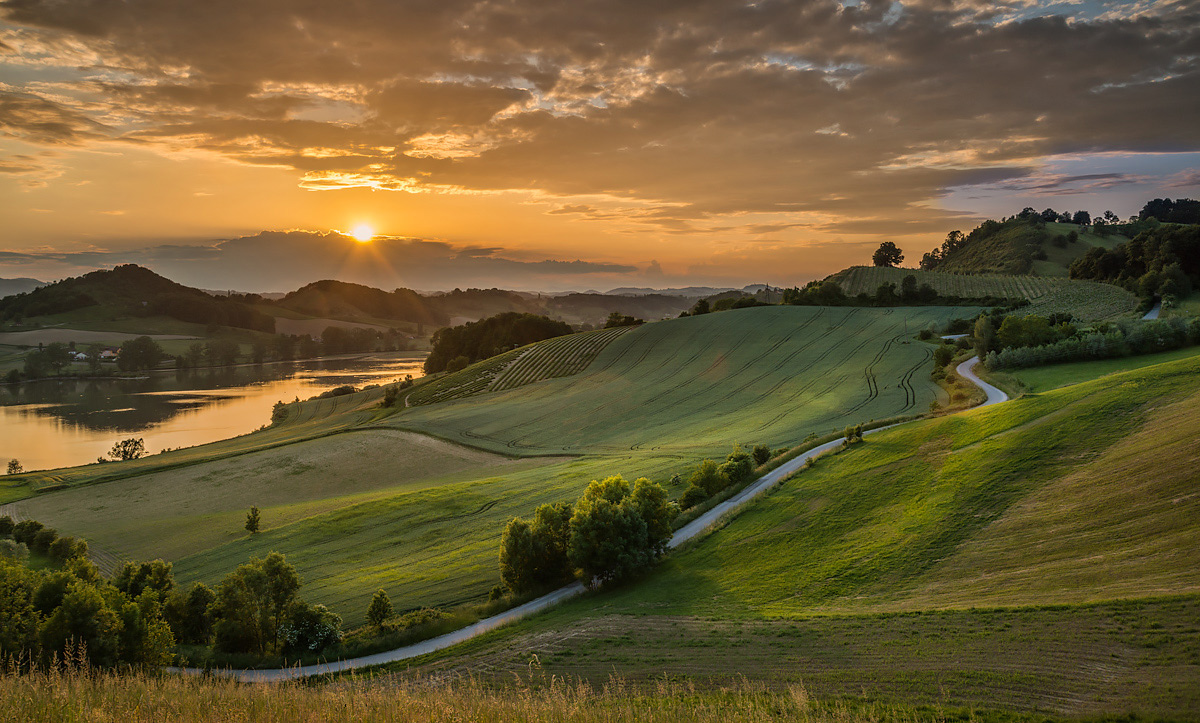 photo "Sunset over the lake" tags: landscape, nature, Pernica, Slovenia, Slovenija, evening, lake, road, sky, sun, sunset