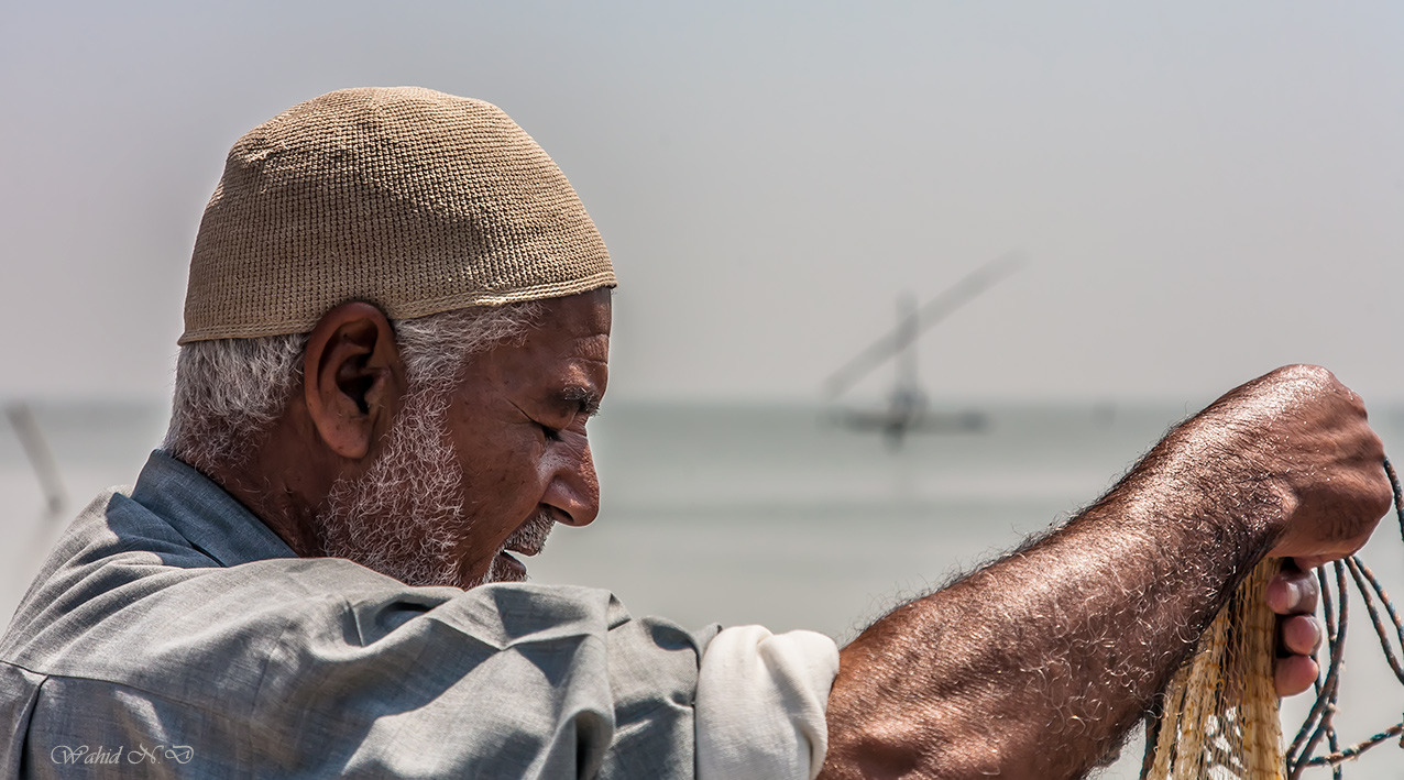 photo "The Fisherman" tags: portrait, genre, misc., Africa, Feelings, fishing, man, water