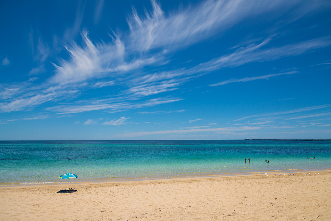 photo "***" tags: landscape, beach, clouds, ocean, sea, sky, swimming, umbrella, water