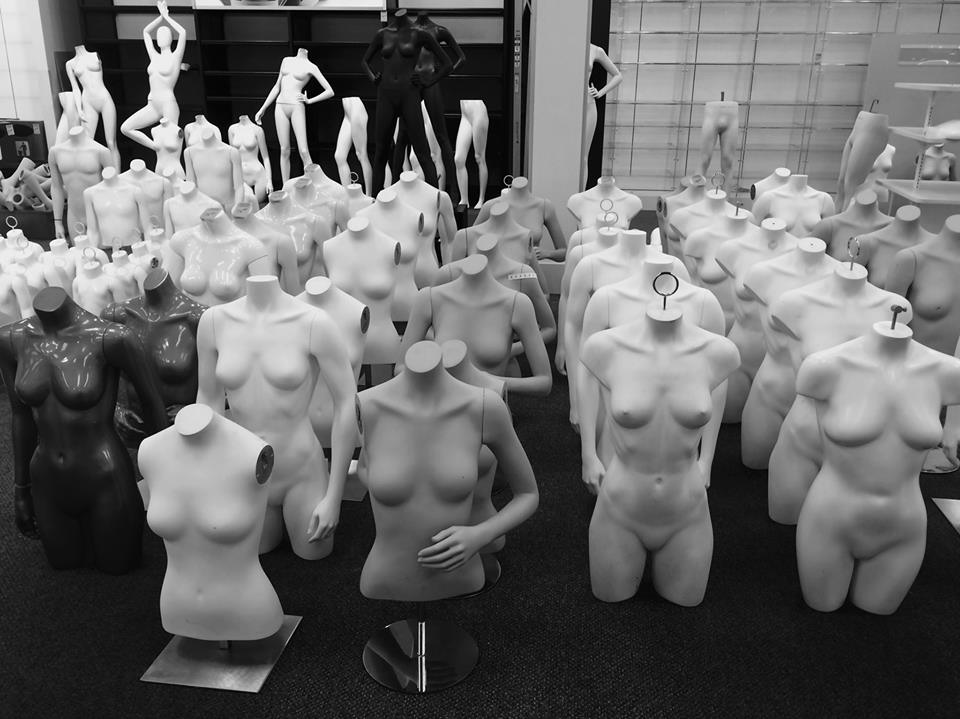 photo "One Size Fits All" tags: black&white, interior, still life, group, mannequins, retail, store