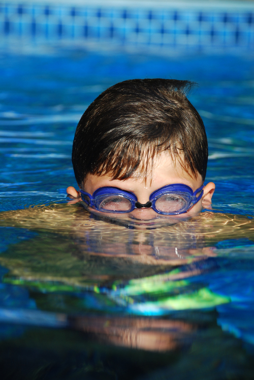 photo "Fishy" tags: portrait, abstract, boy, pool, reflection, water