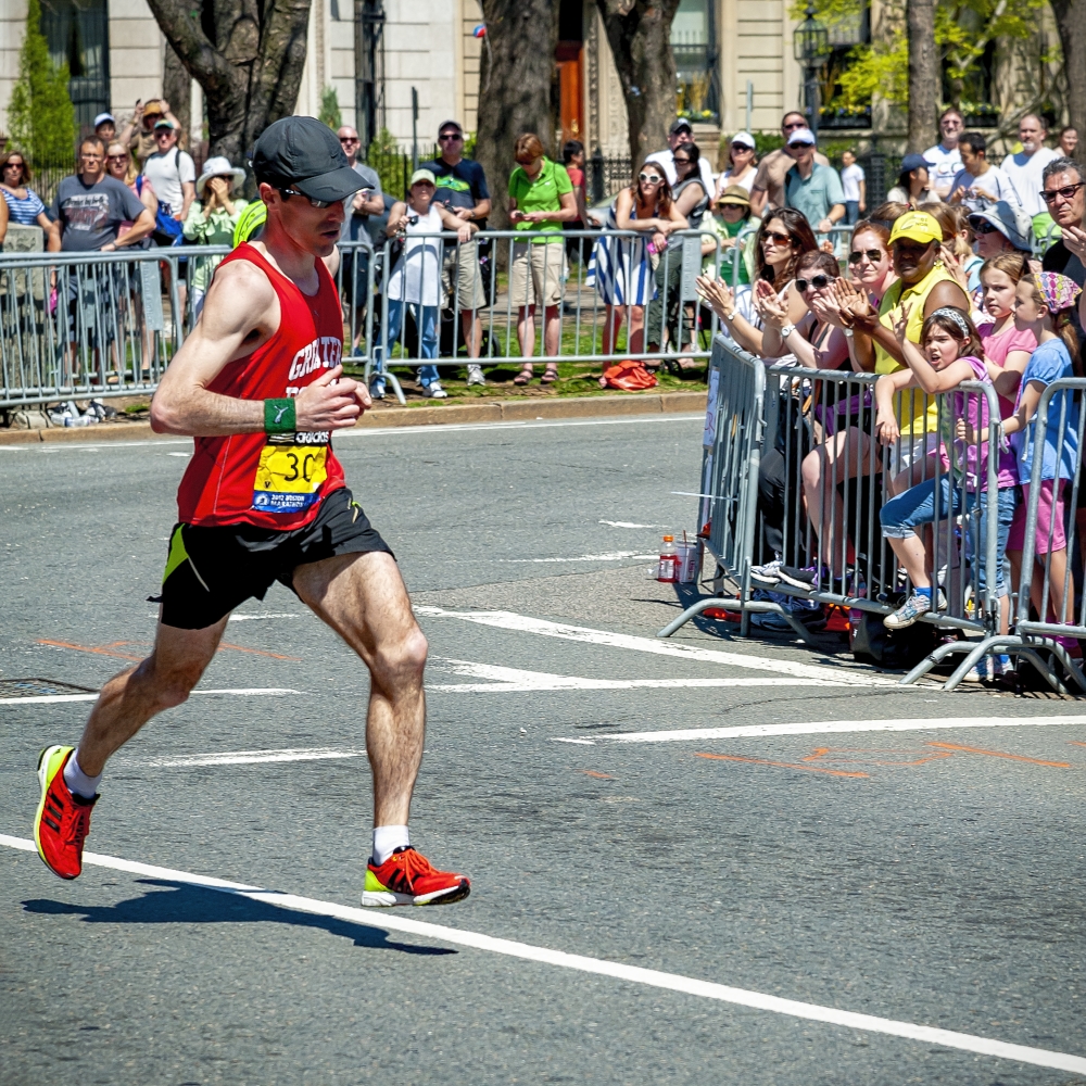 photo "Soaring Boston Marathon Runner" tags: street, 